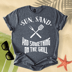 Sun, sand and something on the grill T-Shirt